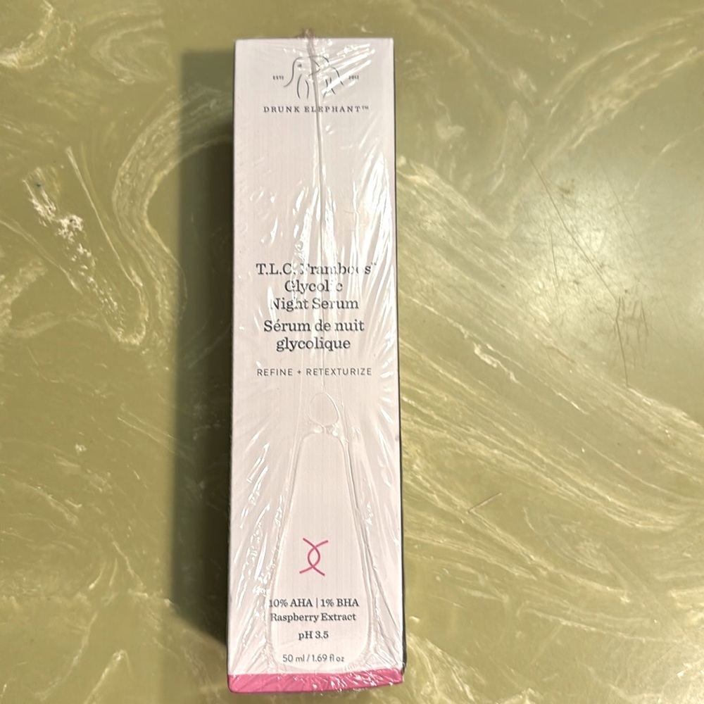 New in box Drunk Elephant TLC framboos glycolic night serum. 50 ml/1.69 Fl oz.